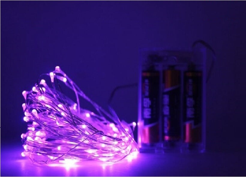 Kerst koperdraad LED verlichting - Paars - 5 meter - Op batterijen Kerst koperdraad LED verlichting - Paars - 5 meter - Op batterijen